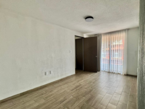 Sala y comedor de departamento en venta en Santa María la Ribera, CDMX
